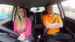 Natural busty babe bangs in driving school car