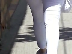 Perfect round ass in tight white pants