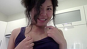 Slim arousing Chinese girl gets naughty in kitchen