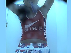 Sporty chick spied in beach cabin changing