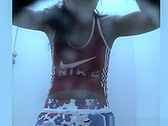 Sporty chick spied in beach cabin changing