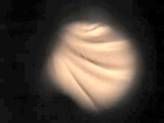 Spying the clean shaved amateur pussy through key hole