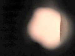 Spying the clean shaved amateur pussy through key hole