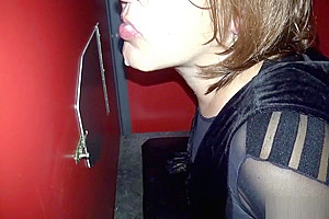 T-Girls sucking and fucking many cocks at the gloryholes