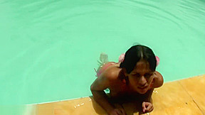 Tatooed ebony tgirl plays with good sized shemeat by pool