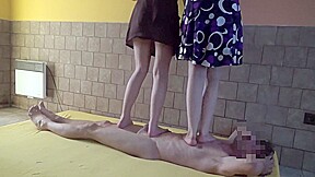 Two Barefoot Mistress Trampling Foot Human Doormat - Two