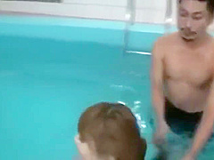 Uncensored Japanese swimsuit girl gets fucked while his friend helps