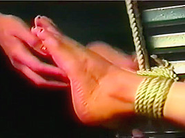 Vintage chairtied girl feet tickled