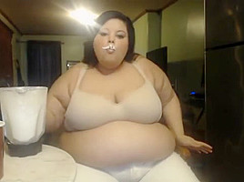 Young Obese Latina Feedee Stuffs Herself Even Fatter