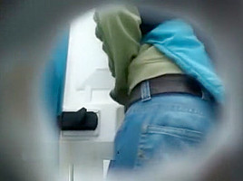 Young women pee in the toilet