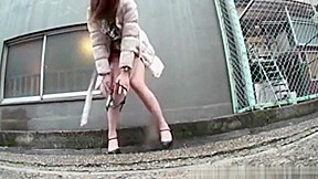 asian girl in a parking lot