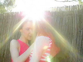 elly and rossy with a bush play a little