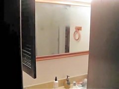 is shooting her naked body reflecting in the mirror