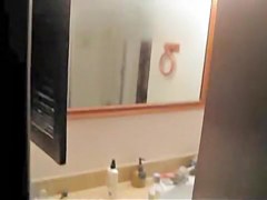 is shooting her naked body reflecting in the mirror
