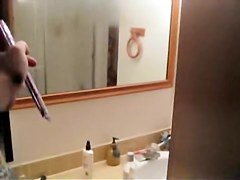 is shooting her naked body reflecting in the mirror