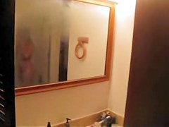 is shooting her naked body reflecting in the mirror